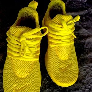 Nike yellow shoes